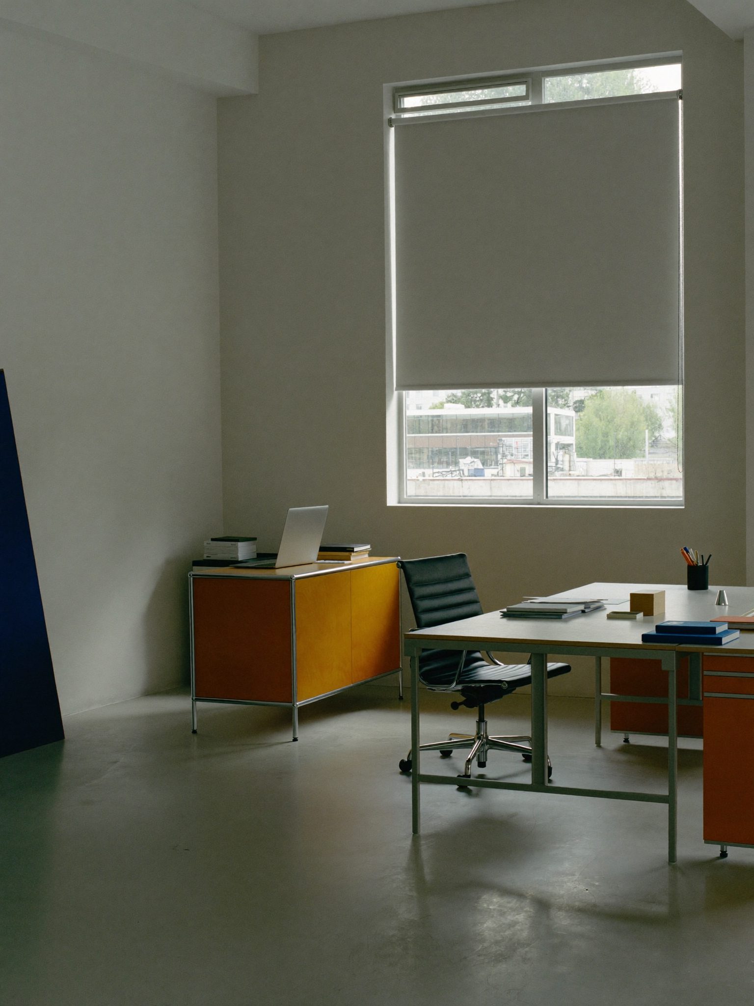 A marked-up tax return ready to file on a minimal office workspace